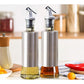 Glass Oil Bottle for Kitchen 300ml with Stainless Steel covered Body